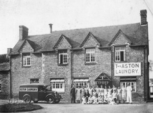 Old photo of Aston Laundry, vintage van and workers.